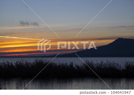 Nove Mlyny reservoir and Palava hills during sunrise in winter, Southern Moravia, Czech Republic Nove Mlyny reservoir and Palava hills during sunrise in winter, Southern Moravia, Czech Republic 104041947