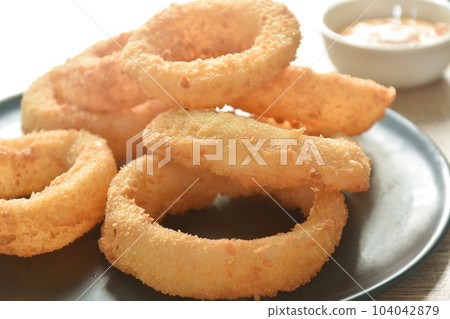 fried onion ring with flour dipping cheese and mayonnaise sauce  104042879