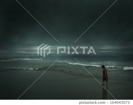 Teenage Boy on Ocean Shore Teenage Boy on Ocean Shore 104043073