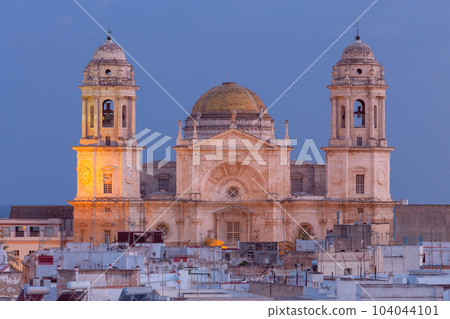 Cathedral of the Holy Cross in Cadiz at sunset. Spain. Cathedral of the Holy Cross in Cadiz at sunset. Spain. 104044101