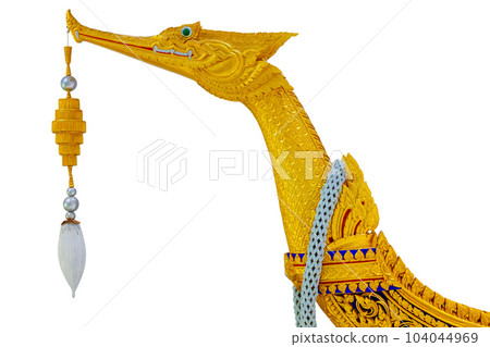 Suphannahong Royal Barge Closeup the boat bow wooden swan carved beautiful golden paint isolated on white background with clipping path. 104044969