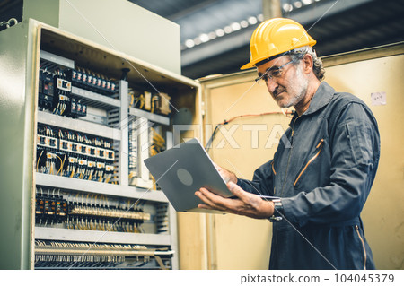 senior electricity engineer male working service maintenance high voltage machine switch cabinet senior electricity engineer male working service maintenance high voltage machine switch cabinet 104045379