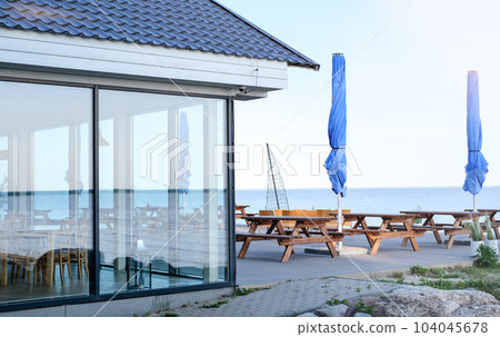 Summer terrace of the restaurant on a clear day. Table near the restaurant close-up 104045678