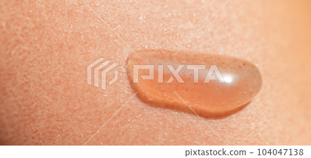 Collagen And Hyaluron Serum Gel On Skin. Splashing of Hyaluron gel. Liquid hyaluronic acid gel on skin. Cosmetic water gel texture on human skin background. Textured background. skin care product. Collagen And Hyaluron Serum Gel On Skin. Splashing of Hyaluron gel. Liquid hyaluronic acid gel on skin. Cosmetic water gel texture on human skin background. Textured background. skin care product. 104047138