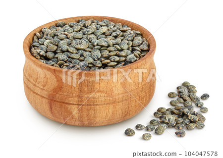 raw french green lentils in wooden bowl isolated on white background with full depth of field 104047578