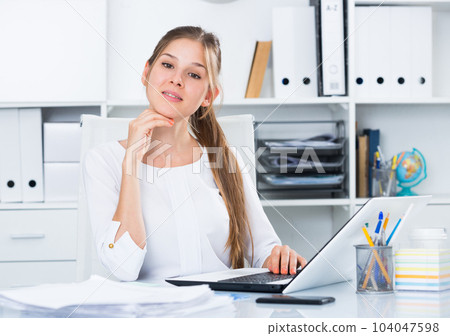 Young businesswoman at working place 104047598