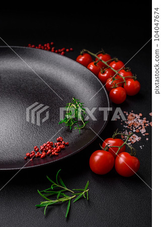 Ingredients for cooking cherry tomatoes, salt, spices and herbs 104047674