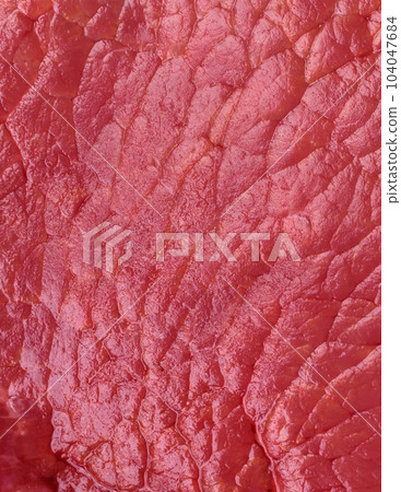 Raw beef eye steak round with salt, spices and herbs 104047684