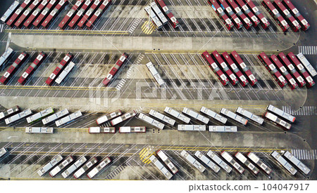 Bus depot red buses top-down view aerial drone shot 104047917