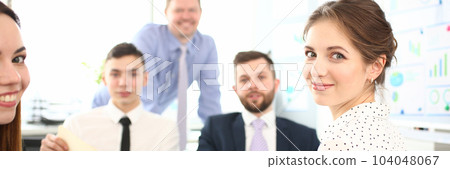 Mentor manager speaks at executive team meeting in boardroom Mentor manager speaks at executive team meeting in boardroom 104048067