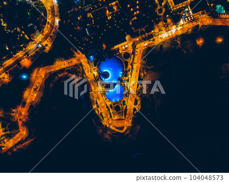 illuminated city with lights, ocean shore with hotels at night, Tenerife, Canary illuminated city with lights, ocean shore with hotels at night, Tenerife, Canary 104048573