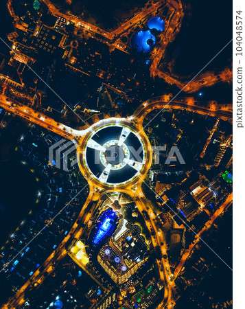 night city view, illuminated light street and road and modern commercial center night city view, illuminated light street and road and modern commercial center 104048574