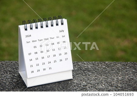 July 2024 white table calendar with customizable space for text. Calendar concept and copy space July 2024 white table calendar with customizable space for text. Calendar concept and copy space 104051693