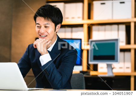 Businessman doing personal computer work 104051907