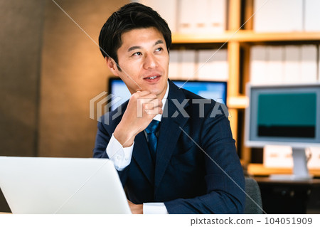 Businessman doing personal computer work 104051909