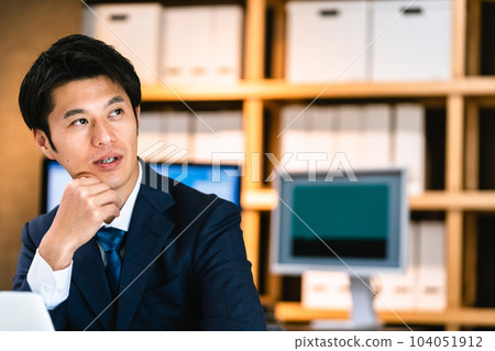 Businessman doing personal computer work 104051912