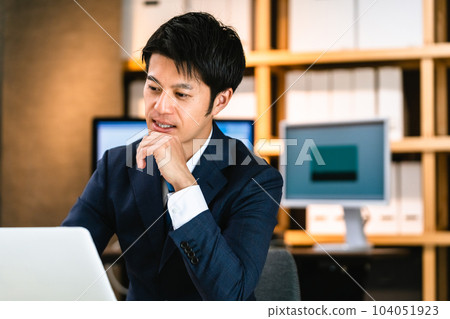 Businessman doing personal computer work 104051923
