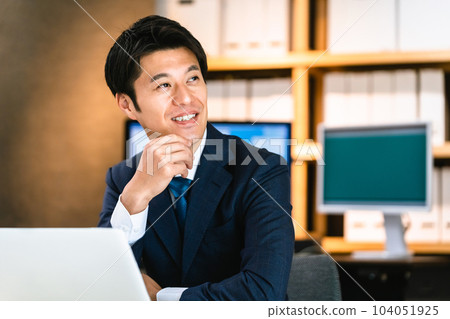 Businessman doing personal computer work 104051925
