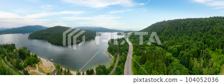 Aerial View of a Highway in City. Cloudy Sky. Aerial View of a Highway in City. Cloudy Sky. 104052036
