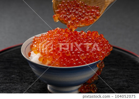 Fresh and delicious salmon roe marinated in soy sauce Fresh and delicious salmon roe marinated in soy sauce 104052075