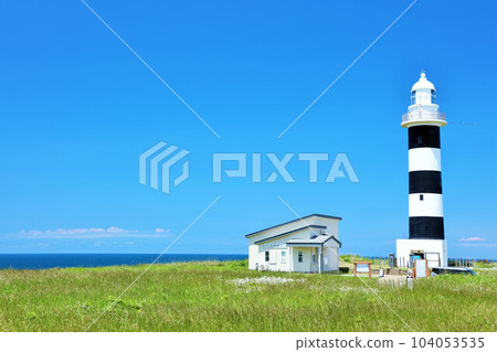 Akita prefecture Oga peninsula Nyudozaki lighthouse in the blue sky Akita prefecture Oga peninsula Nyudozaki lighthouse in the blue sky 104053535