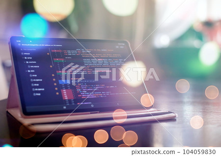 Notebook closeup photo. CSS, JavaScript and HTML usage. Monitor closeup of function source code. Abstract IT technology background. Software source code. Notebook closeup photo. CSS, JavaScript and HTML usage. Monitor closeup of function source code. Abstract IT technology background. Software source code. 104059830
