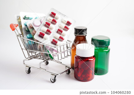 Shopping trolley with blister pill and capsule from drug prescription, pharmacy for treatment health medicine. 104060280