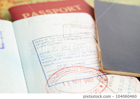 Visa and passport document to immigration at airport in country. 104060460