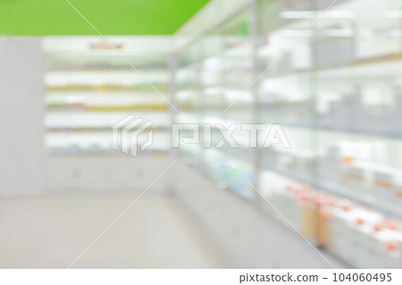 pharmacy drugstore shelves interior blurred abstract background pharmacy drugstore shelves interior blurred abstract background 104060495