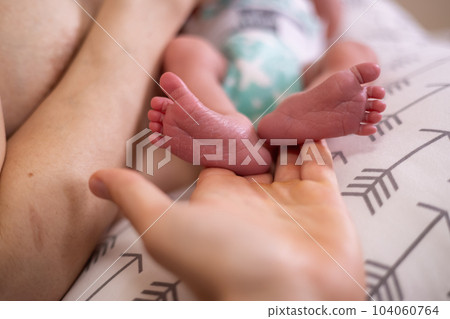 Infant Small Feet Close Up. 104060764