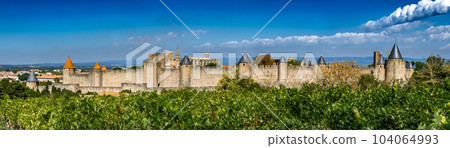 Spectacular Ancient Fortress Of Medieval City Carcassonne And Vineyards In Occitania, France Spectacular Ancient Fortress Of Medieval City Carcassonne And Vineyards In Occitania, France 104064993