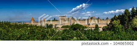 Spectacular Ancient Fortress Of Medieval City Carcassonne And Vineyards In Occitania, France 104065002