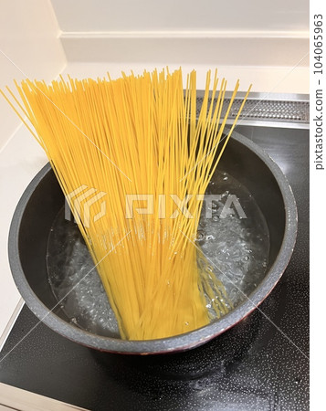 Boiling pasta Boiling pasta 104065963