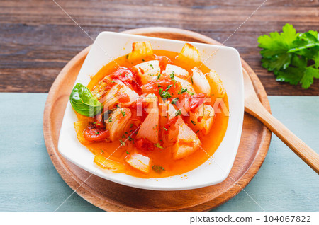 New onion lentil steamed with tomato sauce New onion lentil steamed with tomato sauce 104067822