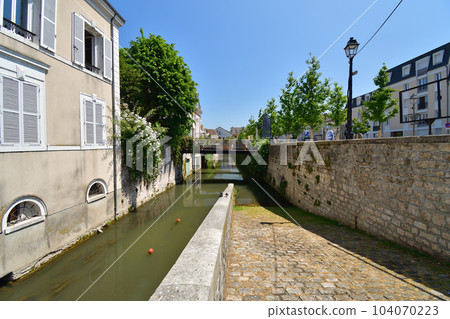 France, Montargis. Cityscape with a canal. Taken May 29, 2023. . 104070223