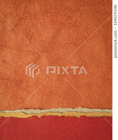 abstract landscape in red and orange - collection of Huun papers handmade in Mexico, vertical background abstract landscape in red and orange - collection of Huun papers handmade in Mexico, vertical background 104070346