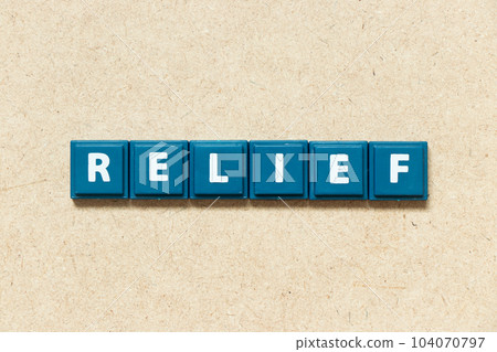 Tile alphabet letter in word relief on wood background Tile alphabet letter in word relief on wood background 104070797