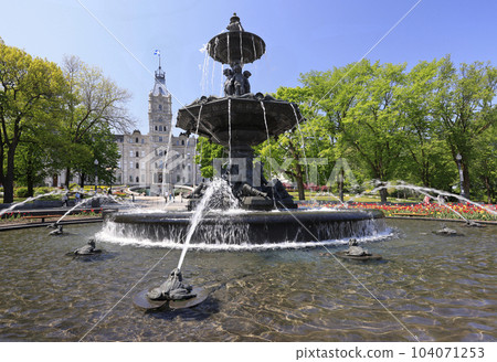 Quebec Parliament building and the Tourny fountain on the foreground Quebec Parliament building and the Tourny fountain on the foreground 104071253