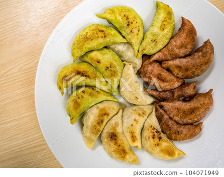 Deep-fried gyoza in a plate Deep-fried gyoza in a plate 104071949