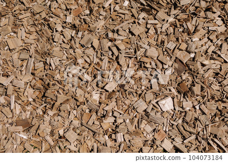Wood shavings on the ground. Top view of sawdust buried in the park. Textures Wood shavings on the ground. Top view of sawdust buried in the park. Textures 104073184