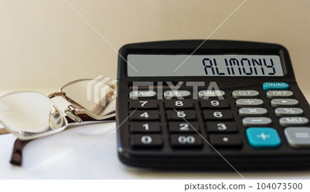 Calculator with the word alimony on the display Calculator with the word alimony on the display 104073500