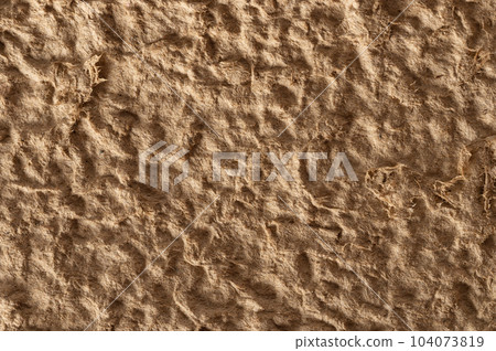 Rough beige color background 104073819