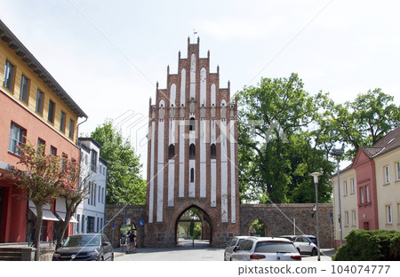 Stargarder Gate in Neubrandenburg (old town side) featuring a terracotta statue called Adrant Stargarder Gate in Neubrandenburg (old town side) featuring a terracotta statue called Adrant 104074777