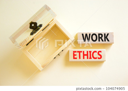 Work ethics symbol. Concept words Work ethics on beautiful wooden block. Beautiful white table white background. Empty wooden chest. Business and Work ethics concept. Copy space. 104074905