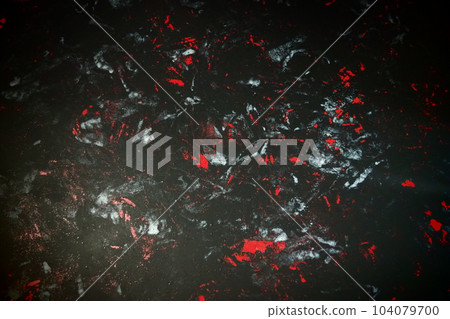 Black background with red, white, gray and blue strokes, dashes, stains and scuffs. A ray of light Black background with red, white, gray and blue strokes, dashes, stains and scuffs. A ray of light 104079700