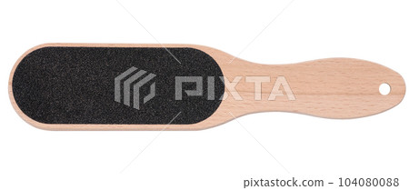 Wooden spatula with an emery surface for pedicure on a white isolated background 104080088