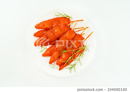 Chicken fillet inner skewers.Fresh raw marinated chicken meat skewers iner fillet on a white background.Top view.Copy space.Chicken fillet inner skewers.Food concept. 104080189