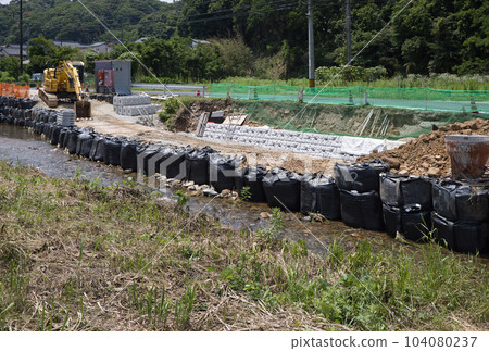 River bank protection work Scouring prevention work along roads damaged by heavy rain River bank protection work Scouring prevention work along roads damaged by heavy rain 104080237