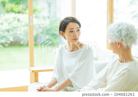 Living room family middle senior woman Living room family middle senior woman 104081261