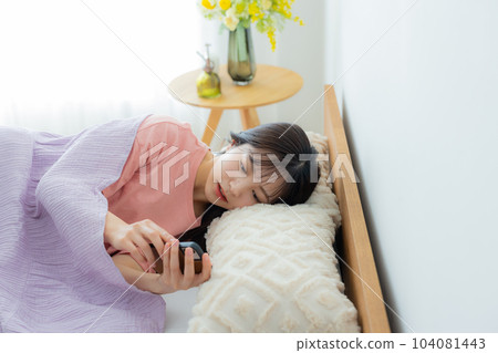 The woman in the bedroom The woman in the bedroom 104081443